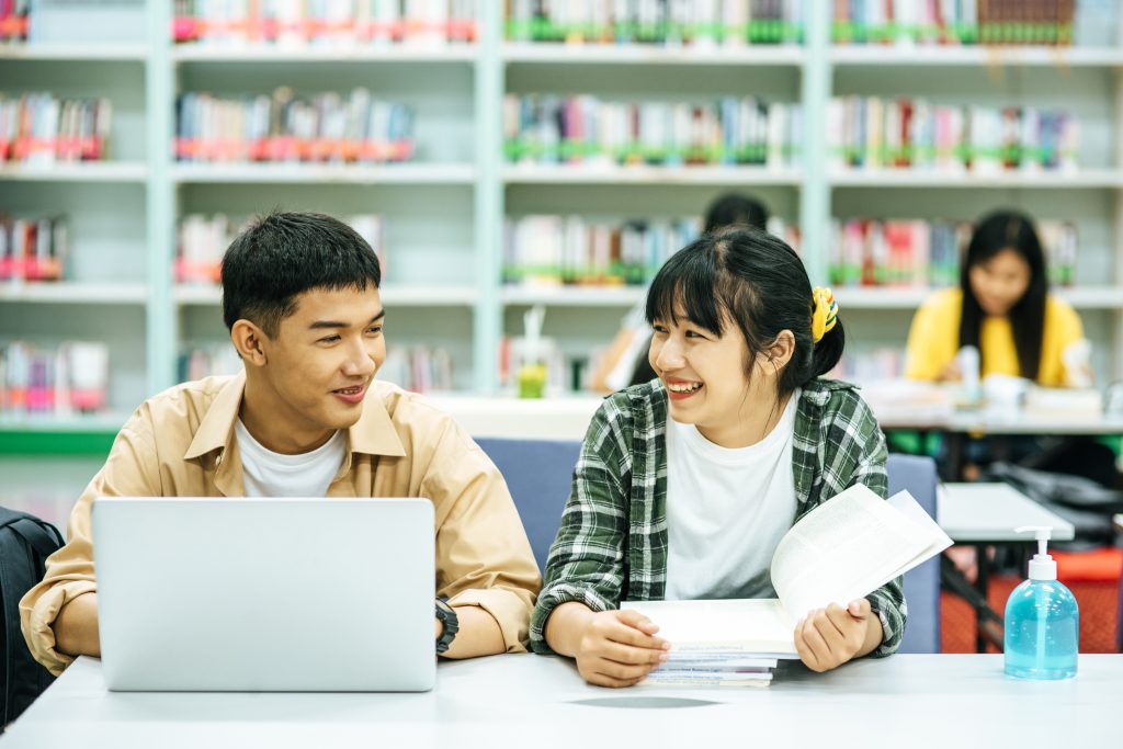 students discuss assignments in a O levels math tuition