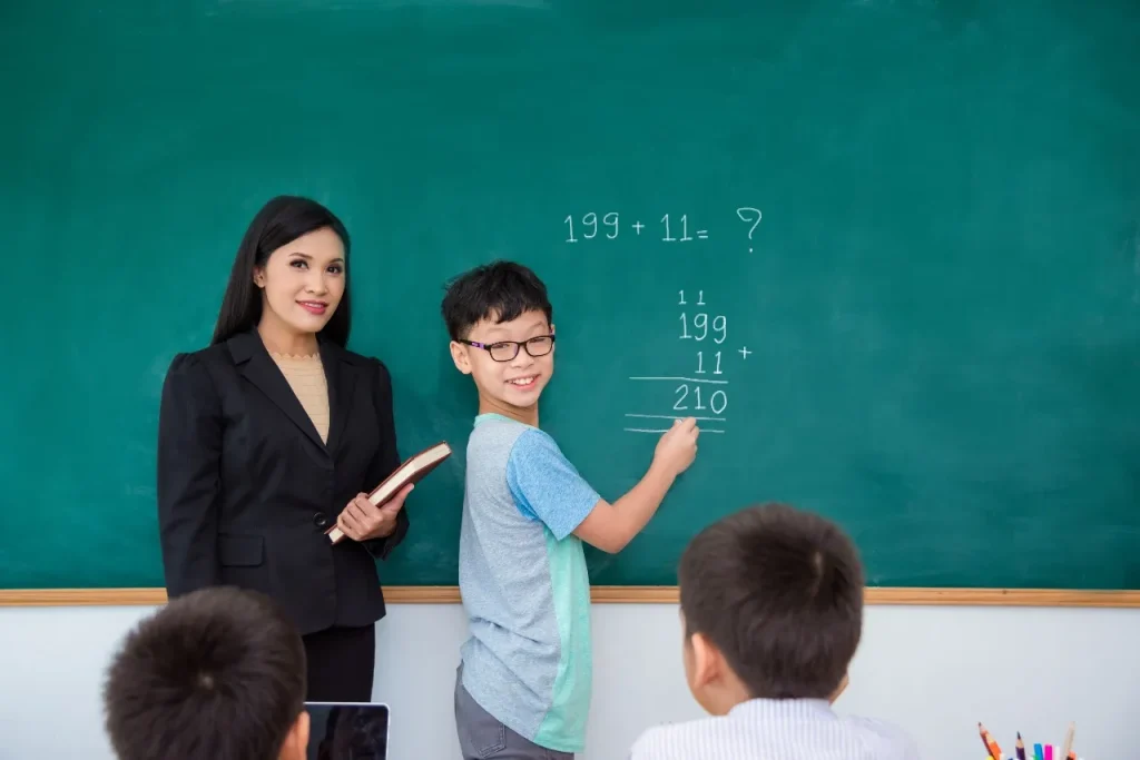 student and teacher in math tuition singapore | Top Math Tuition