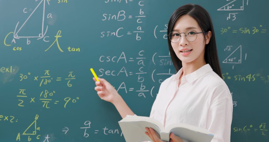 A-Math Tuition tutor teaching complex algebra concepts