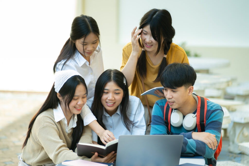 Group of students getting Hwa Chong Math Tuition on campus outdoors