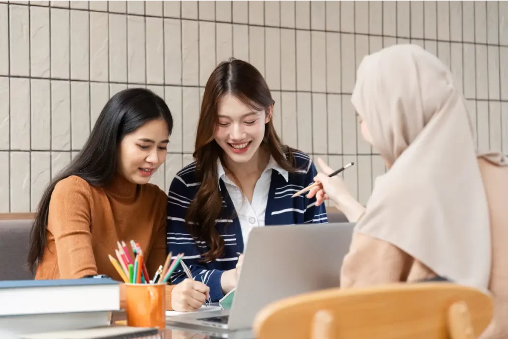Asian teenagers studying H2 maths at a tuition centre