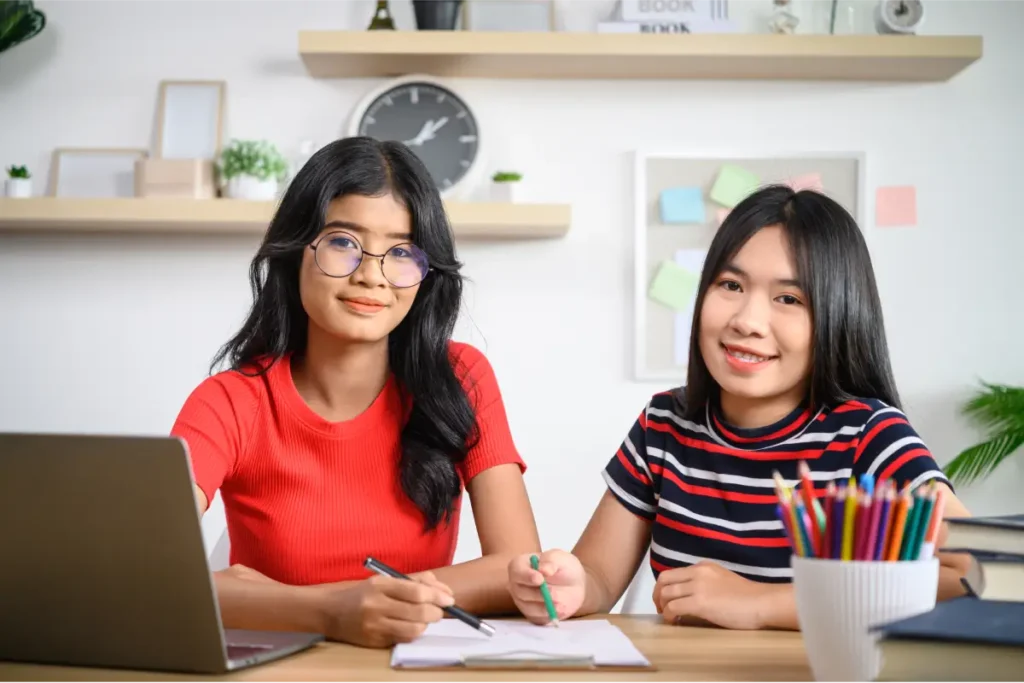 Asian teen studying at a tuition centre